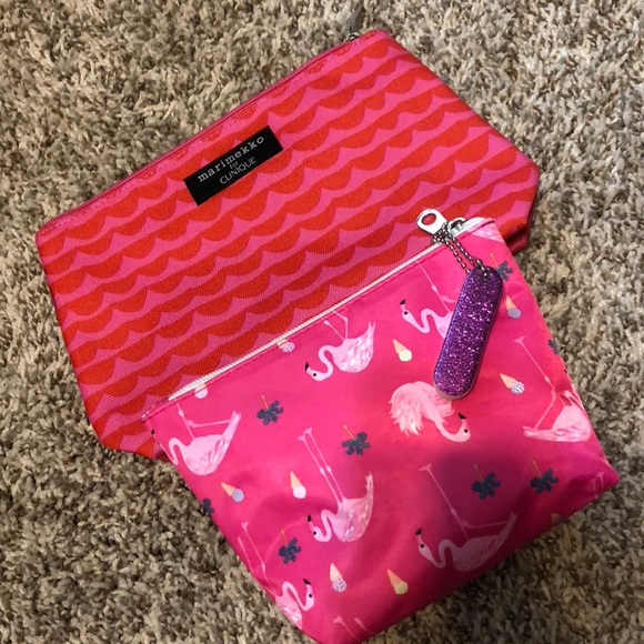 Clinique Handbags - Pair of cosmetic bags! NWOT
